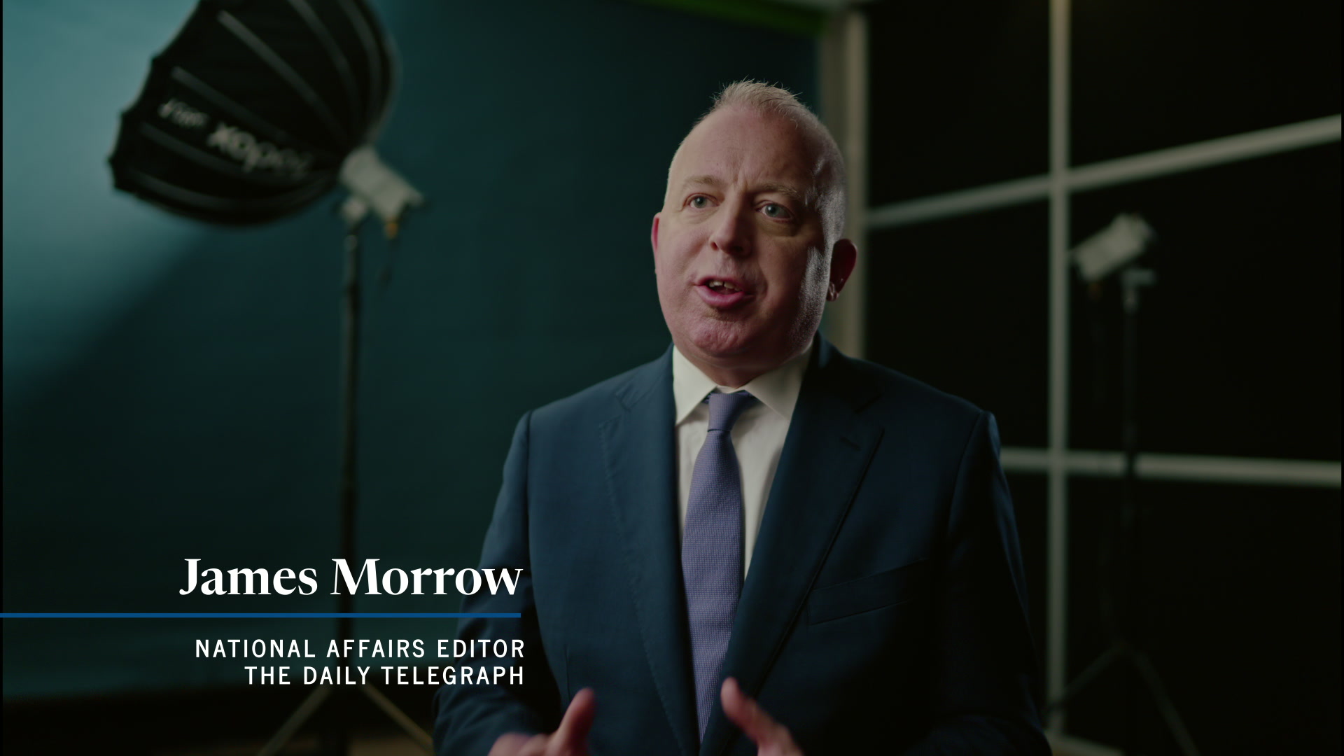 Interview in a dark studio, moody key light